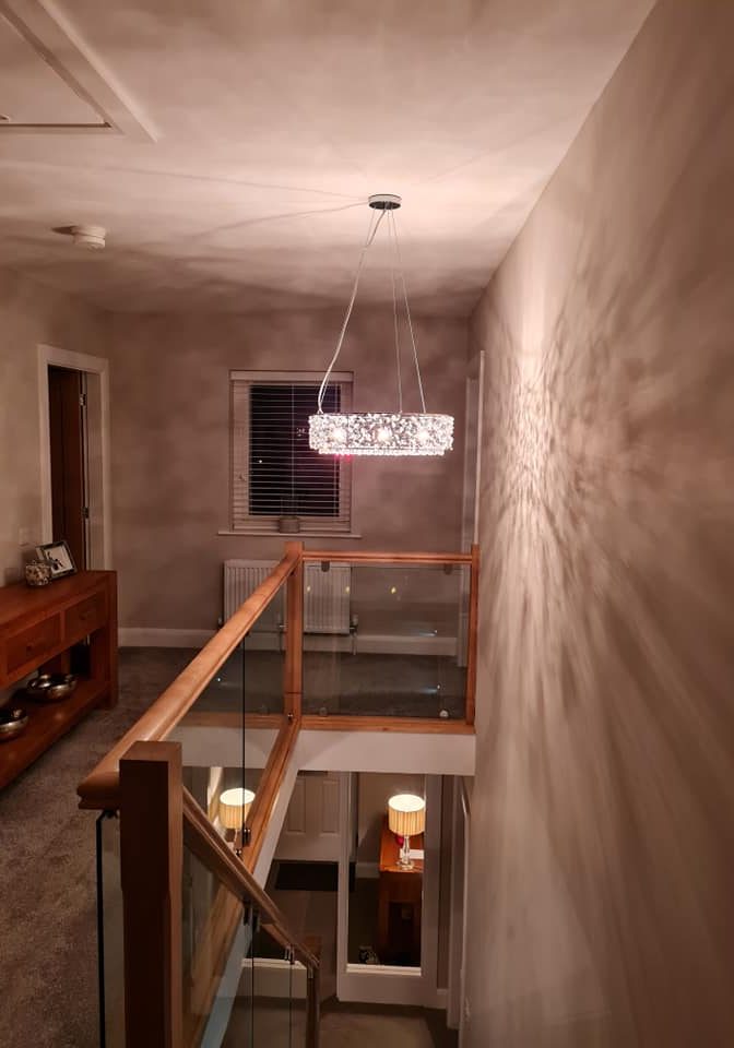 large dropped landing light over stairs