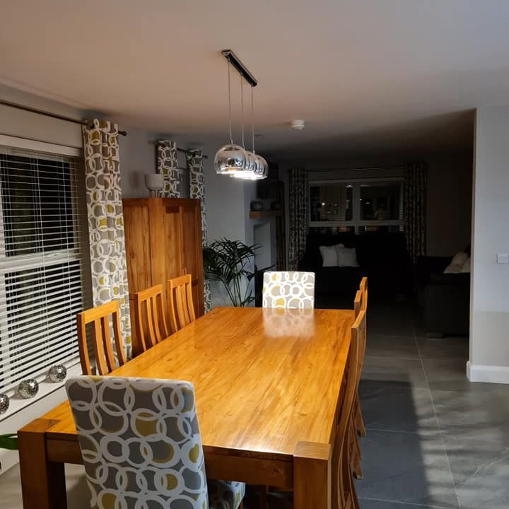 trio of globe lights over kitchen table