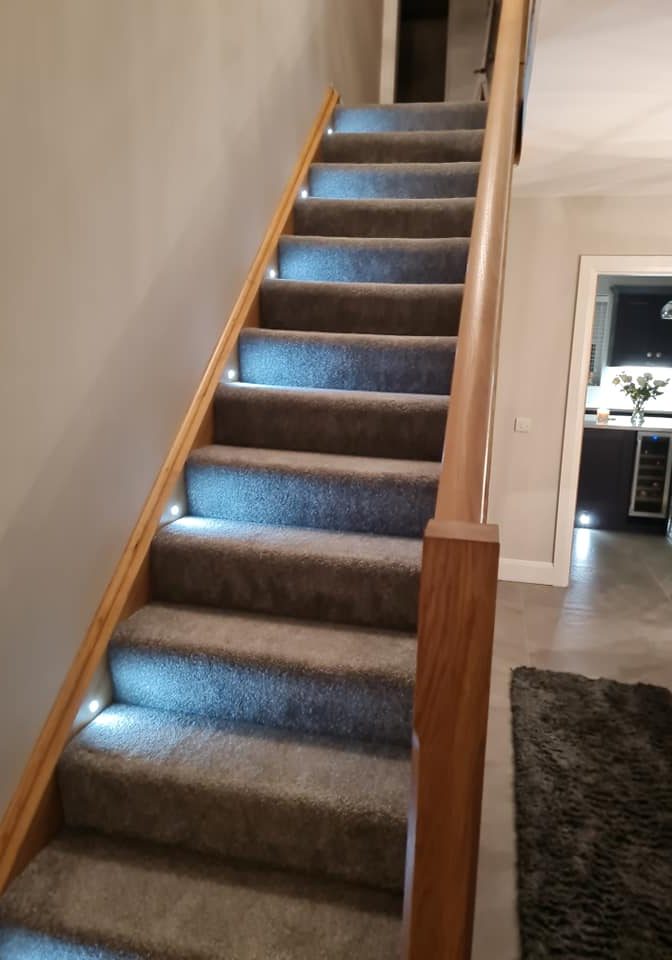 Lights on home carpeted stairs